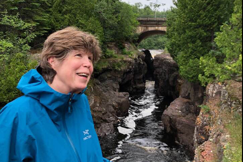 Joannie hiking by Cascade River